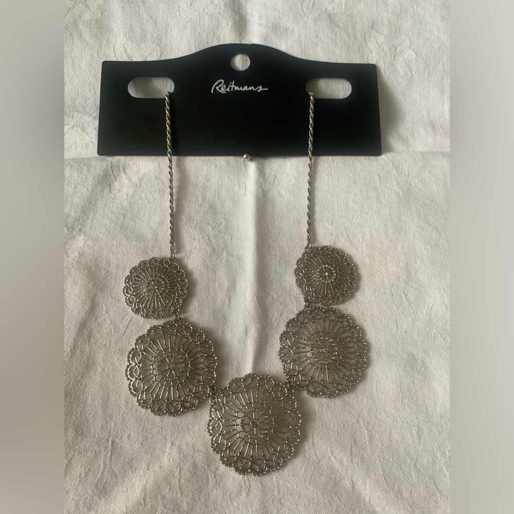 Reitmans intricate filigree design silver tone necklace